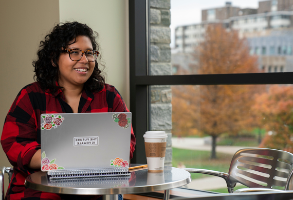 An image of a student on their laptop.